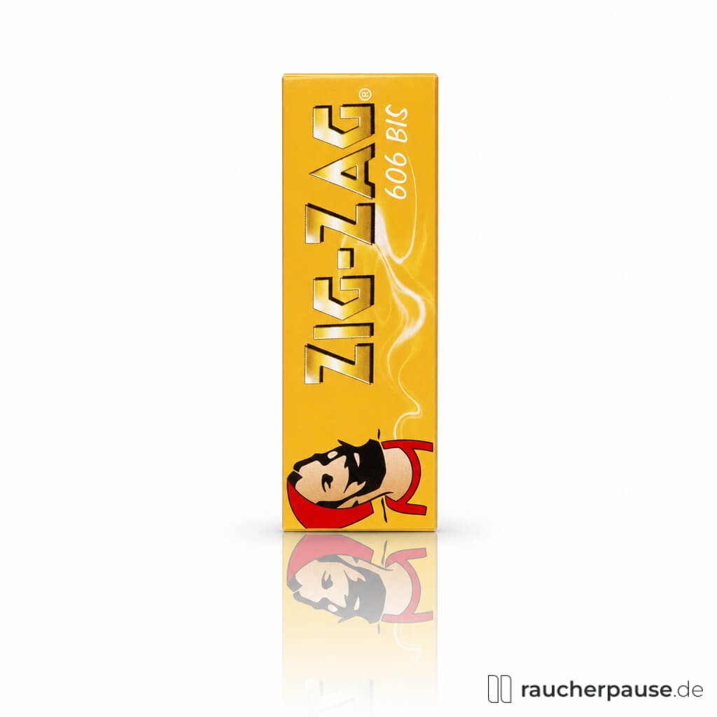Gelbe Box mit stilisiertem Logo und rotem Hintergrund, auf dem ein Mann mit Bart abgebildet ist, von ZIG-ZAG Gelb No. 606 Zigarettenpapier, 50 Blättchen.