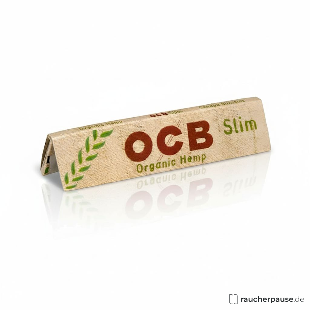 Schachtel mit braunem, naturbelassenem Design und grünem Blätter-Logo: OCB Weiß Long Zigarettenpapier, Queen Size 44x109mm, Flachs/Hanf, Natürliches Gummi arabicum.