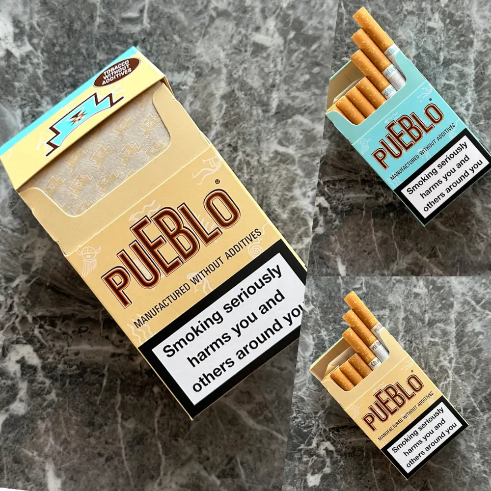 Pueblo Zigarettenpackung ohne Zusatzstoffe mit sichtbaren Zigaretten und Warnhinweis über die Gesundheitsrisiken des Rauchens.