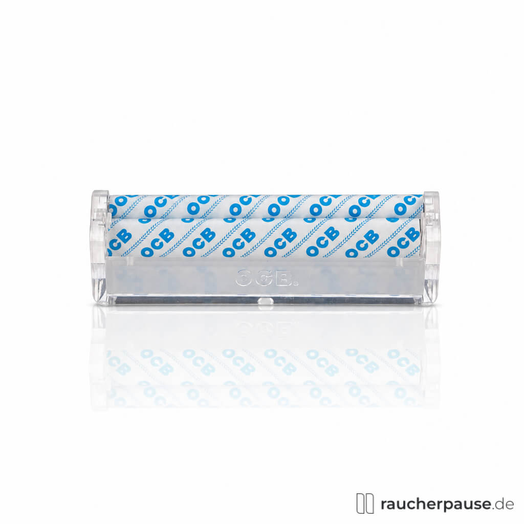 OCB Cristal Roller Lang Drehmaschine in transparenter Dose mit weißem Papierstreifen und blauen OCB-Logos in minimalistischem Design.